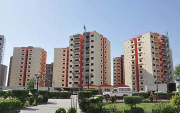 تسليم البناية الأولى من مجمع الزهور السكني الى المسجلين 1 مجمع الزهور