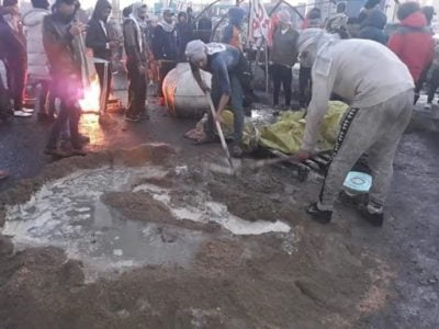 مقتل وإصابة 7 متظاهرين برصاص الأمن في الناصرية 1 بناء حايط بالناصرية 1 scaled