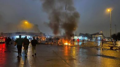 بالصور.. غلق مرآب النهضة في بغداد بالاطارات المحترقة 9 كراج نهضه 1