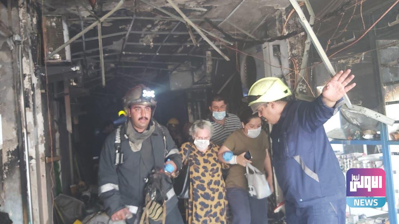 بالصور.. حريق كبير في الكرادة والدفاع المدني ينقذ 20 مواطنا4
