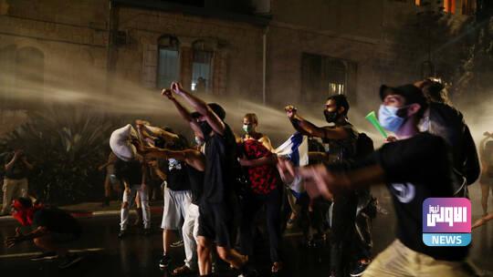 الشرطة تفرق المحتجين المعارضين لنتنياهو بخراطيم المياه 1 601688a942360456196d91fd