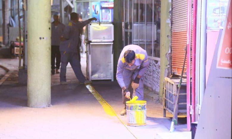 تطبيق نظام الخط الأصفر لتقليل التجاوزات على أرصفة الكوفة 1 IMG 20210620 WA0045